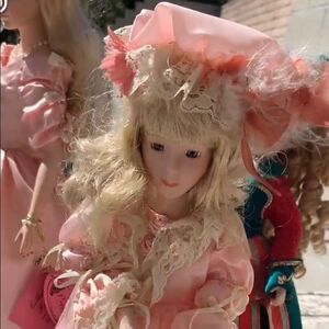 Pink doll with umbrella 🌂